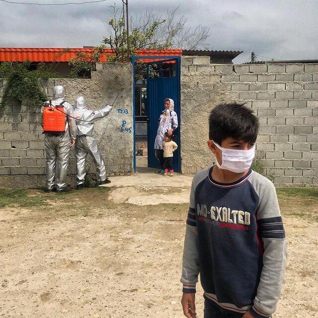 گفت‌وگو با عکاسی که از خاکسپاری مردگان کرونا عکس گرفت